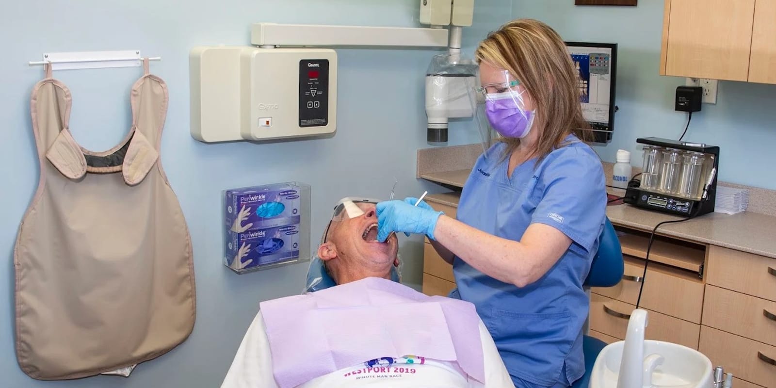 A treatment room at Radiant Smiles, looking across the chair to the cabinetry.