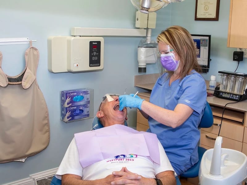A treatment room at Radiant Smiles, looking across the chair to the cabinetry.
